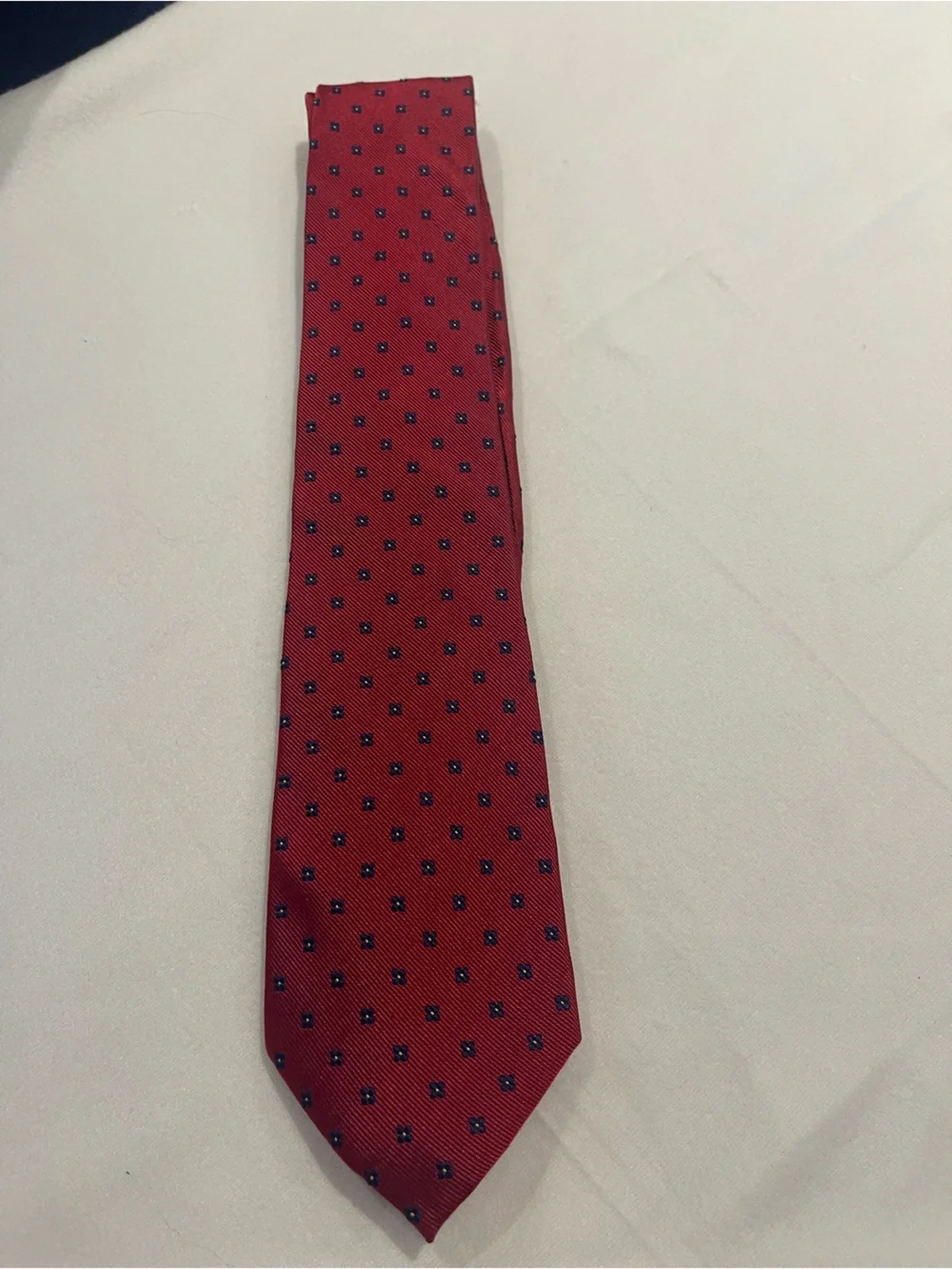 Classic Men's Red Tie with Navy Dot Accent